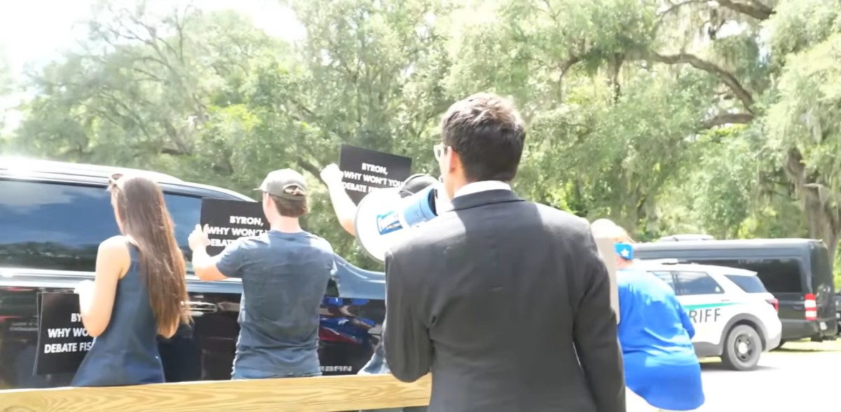 Bullhorns and 'Blah-Blah' Gestures: Fishback Crashes Donalds Campaign Event in Lake City
